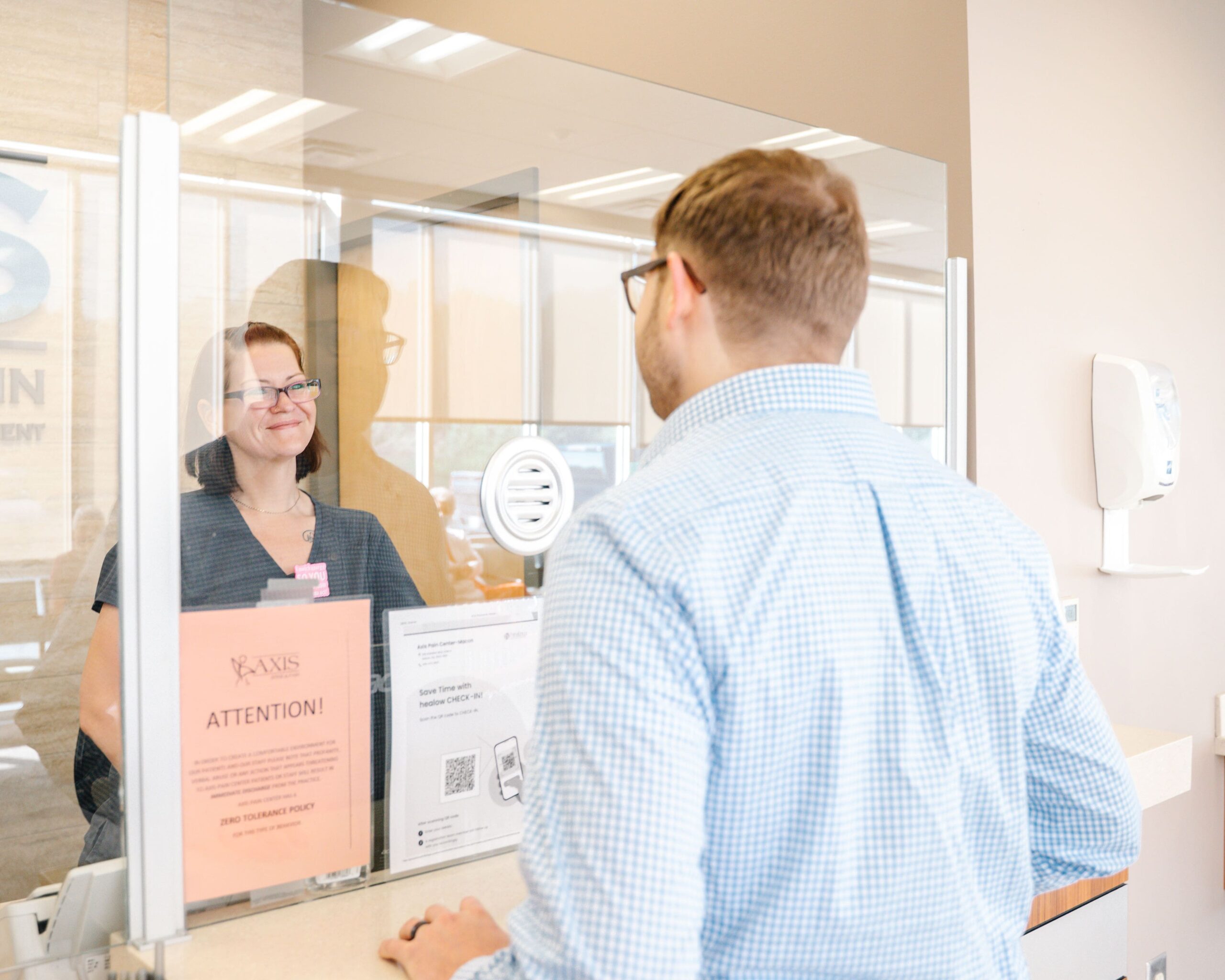 A calming image of a spine with highlighted areas of pain, set against a neutral medical background, and featuring a simple "Georgia" overlay.